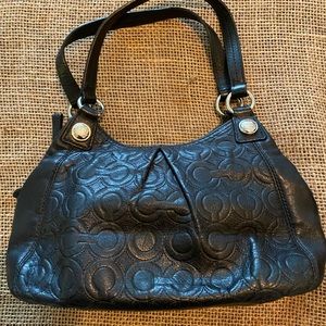 Coach small black leather purse.